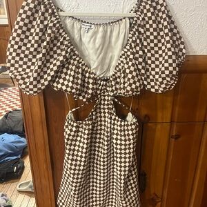 Trendy Checkered Dress in Brown and White with cut outs.